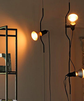 Luminaire Parentesi, FLOS. Claude Cartier décoration architecte d'intérieur à Lyon.